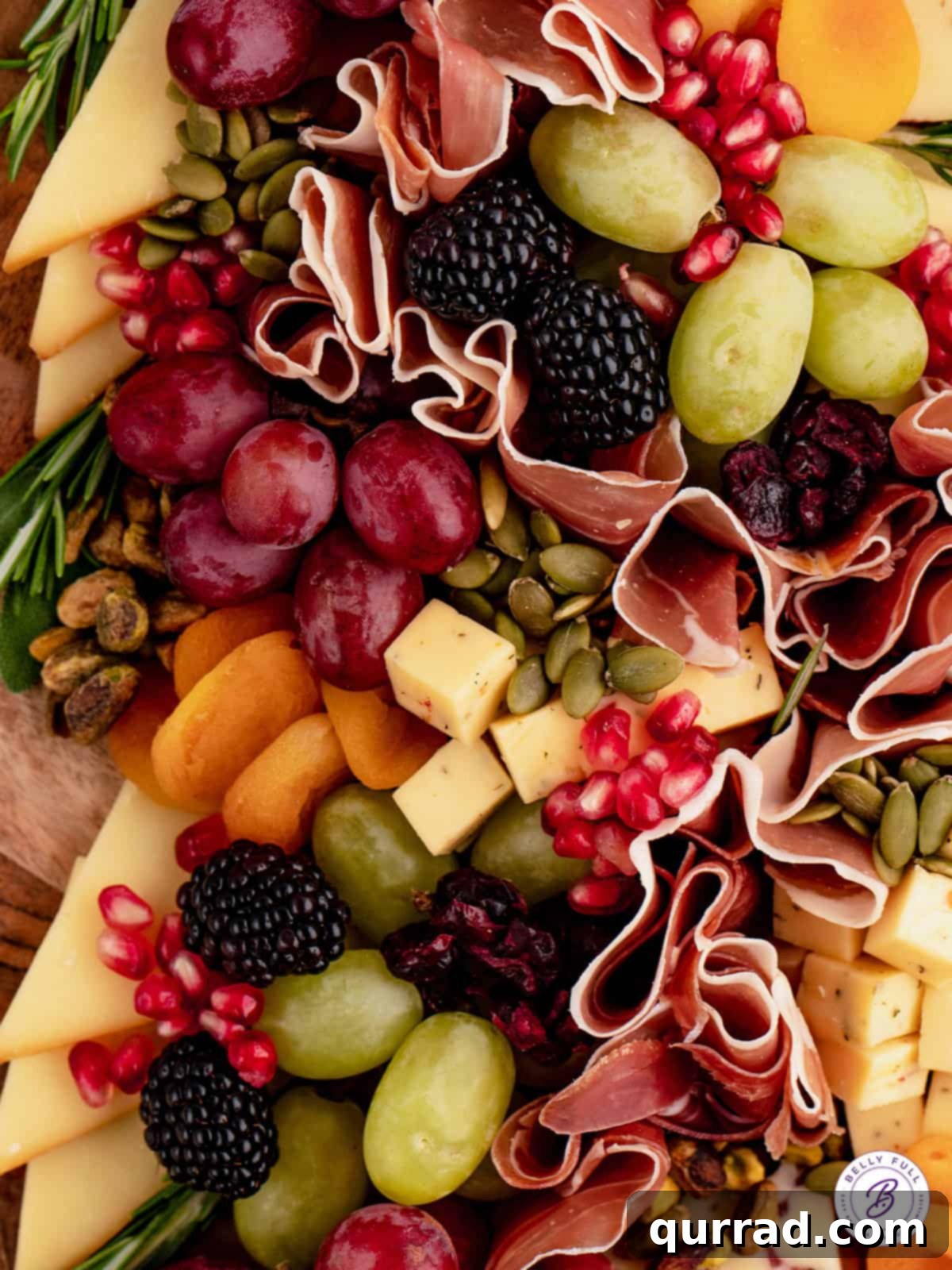 A captivating close-up of a Christmas Tree Charcuterie Board, emphasizing the freshness and artistry of its components. A detailed close-up of a festive Christmas charcuterie board, highlighting the fresh berries and intricate arrangement.