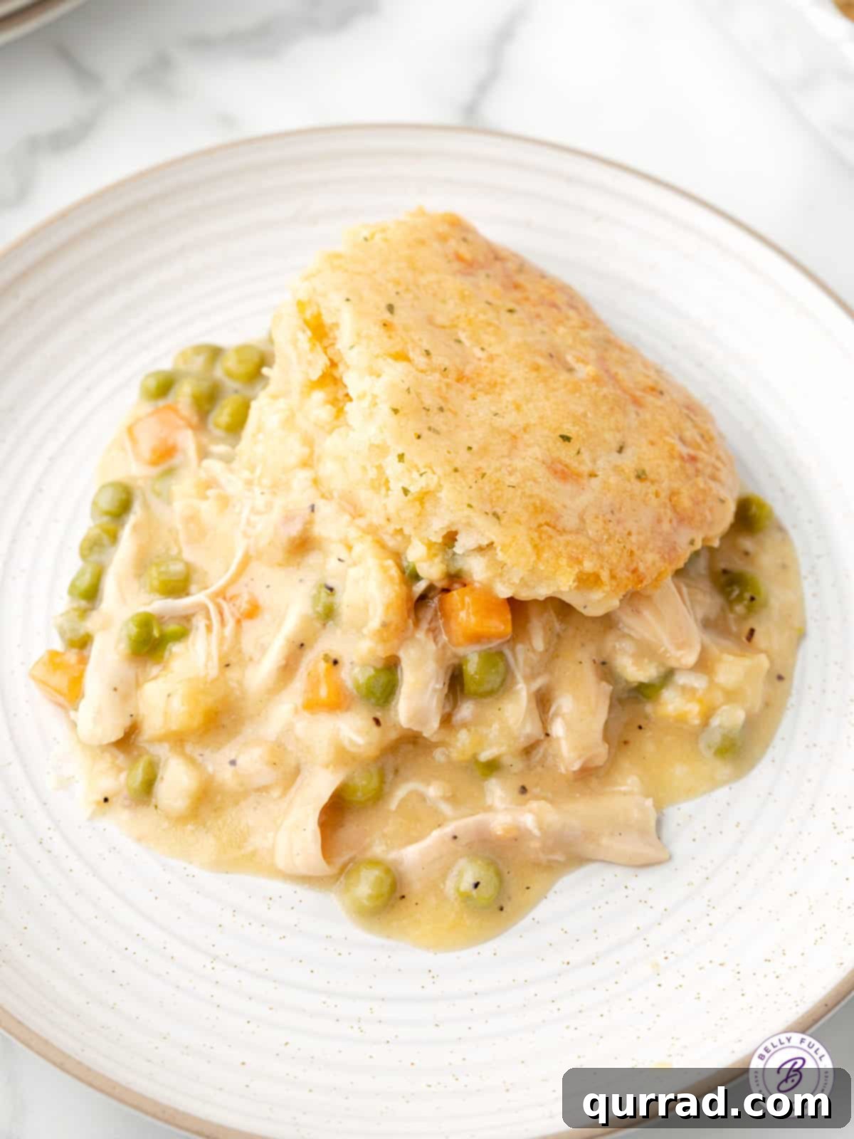 Chicken & Biscuit Pot Pie 6 serving of chicken pot pie casserole on white plate