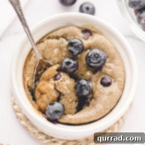 Overhead view of blended baked oats with blueberries