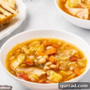 Angled view of a bowl of healthy cabbage soup