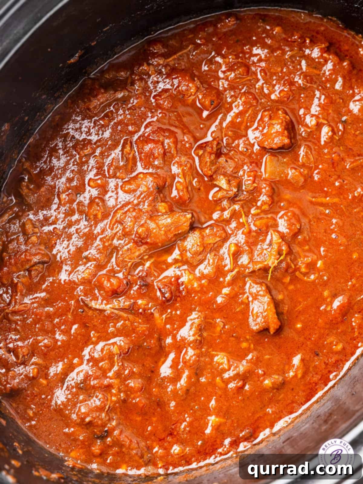 Beef ragu sauce in a slow cooker