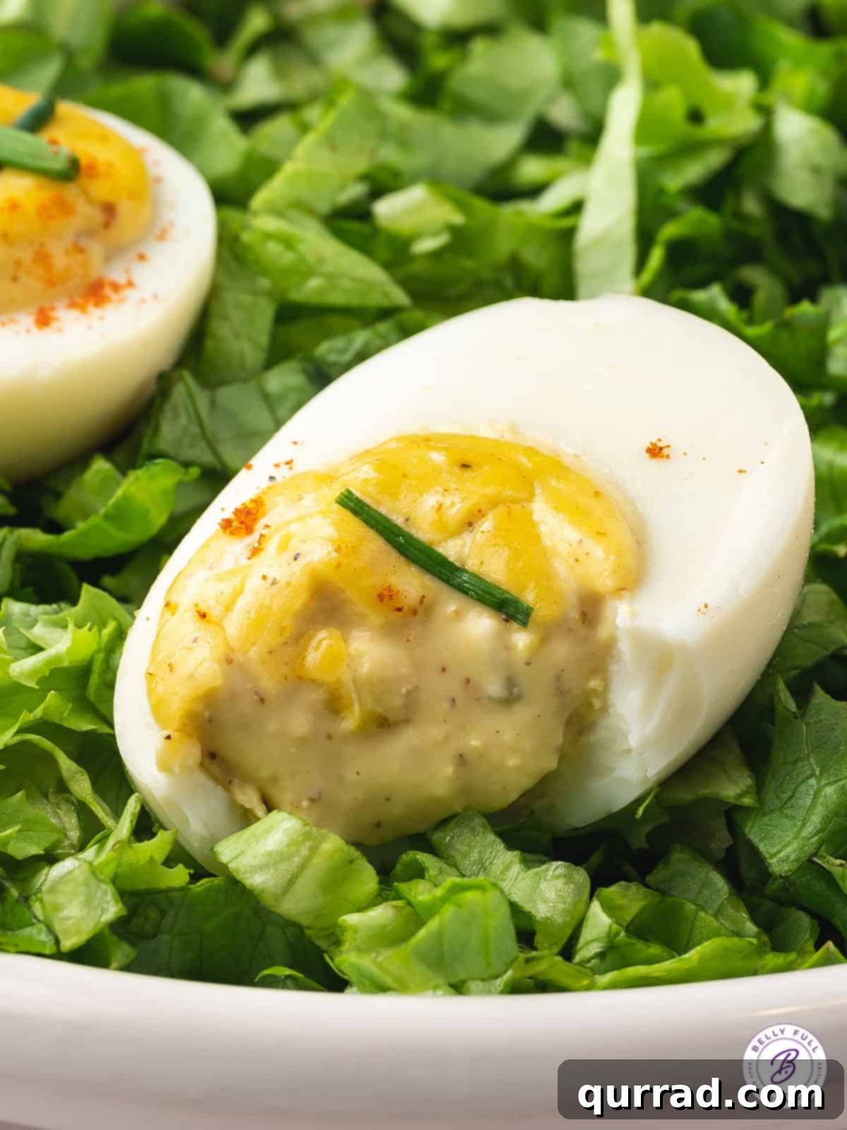 Touchdown Deviled Eggs 4 deviled egg with bite taken