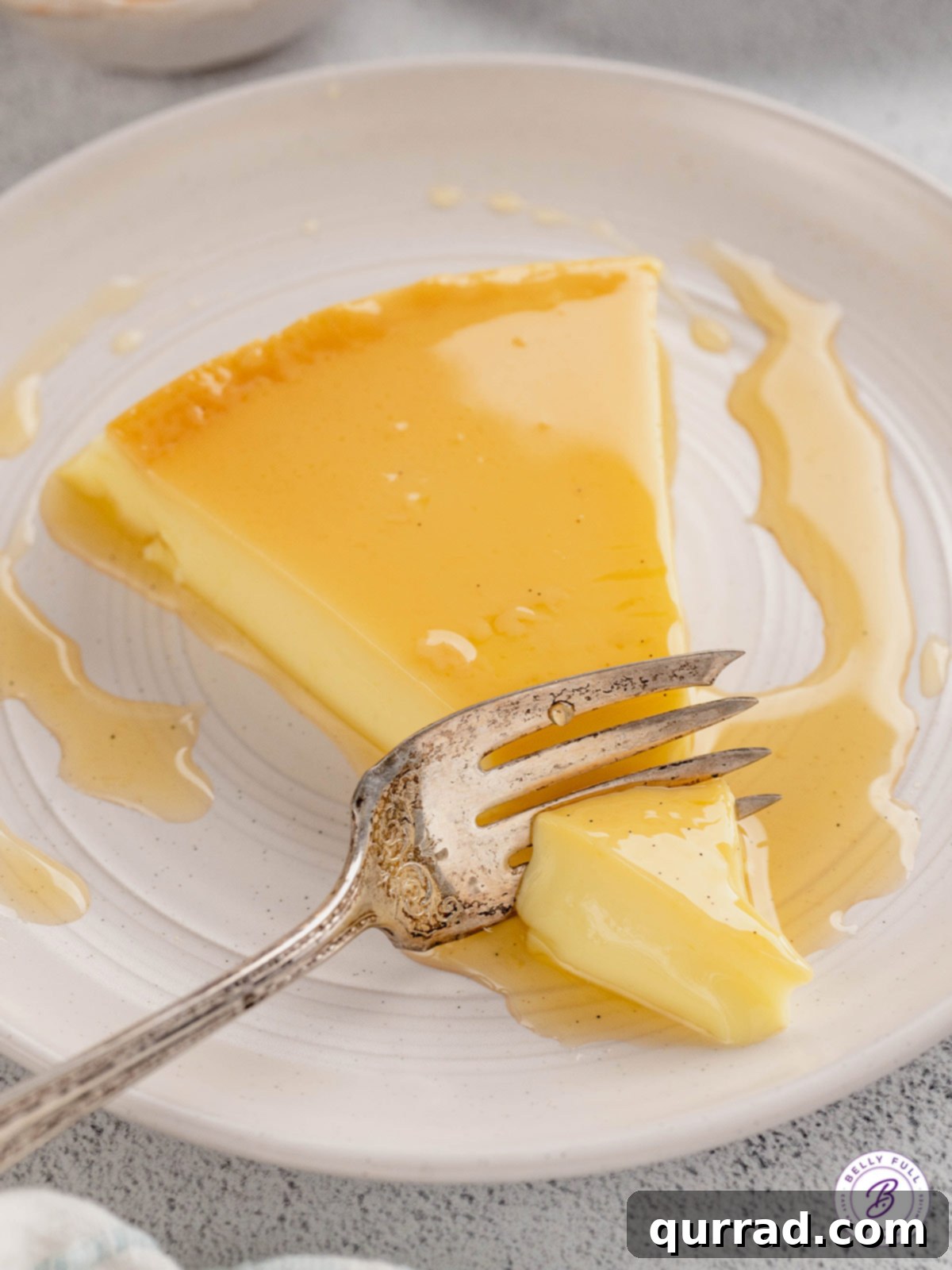 A fork slicing into a piece of Mexican flan