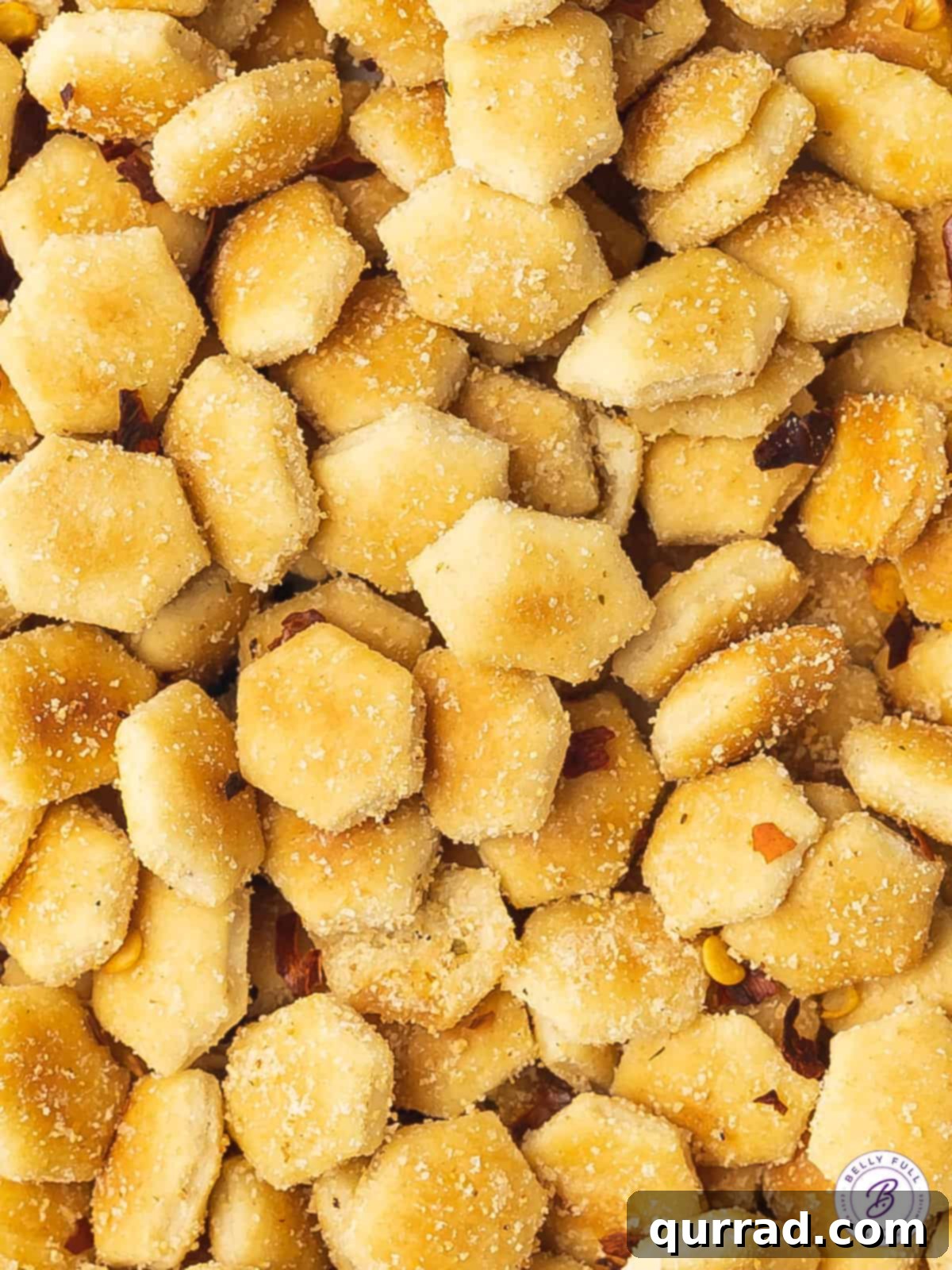A Symphony of Sparks 4 Close up view of fire oyster crackers sprinkled with extra crushed red pepper flakes for maximum spice