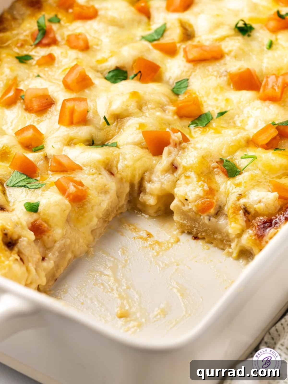 Made with biscuits, chicken breast, and homemade alfredo sauce, this Chicken Alfredo Bubble Pizza makes a quick and easy weeknight dinner. Chicken alfredo bubble pizza with a slice missing