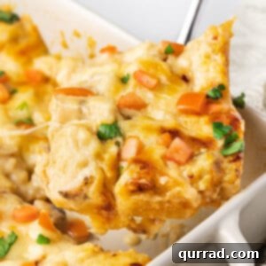 Chicken Alfredo Pull-Apart Pizza 2 A slice of chicken alfredo bubble up being served