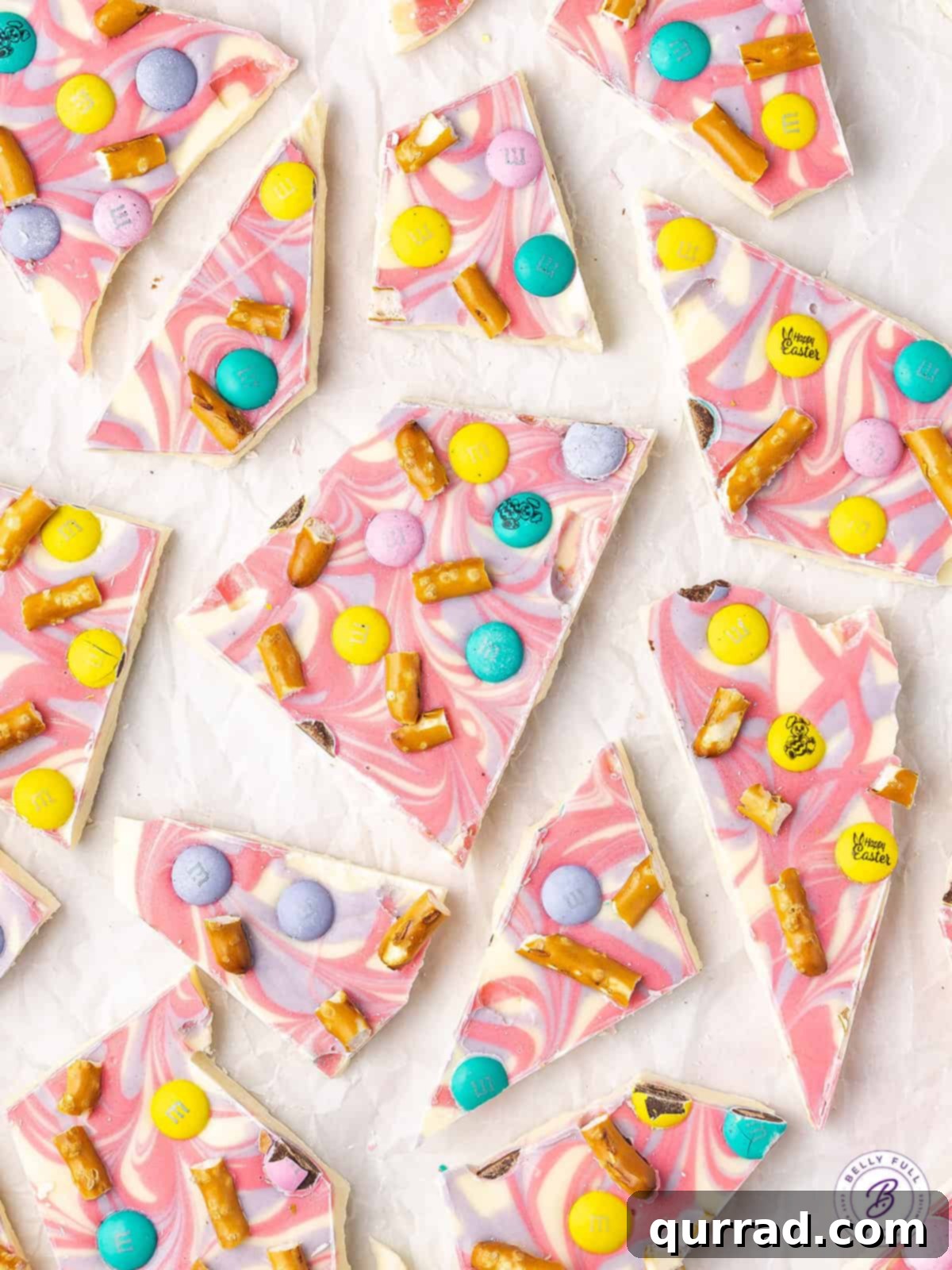 Whimsical Easter Bark 3 broken up Easter Chocolate Bark on parchment paper