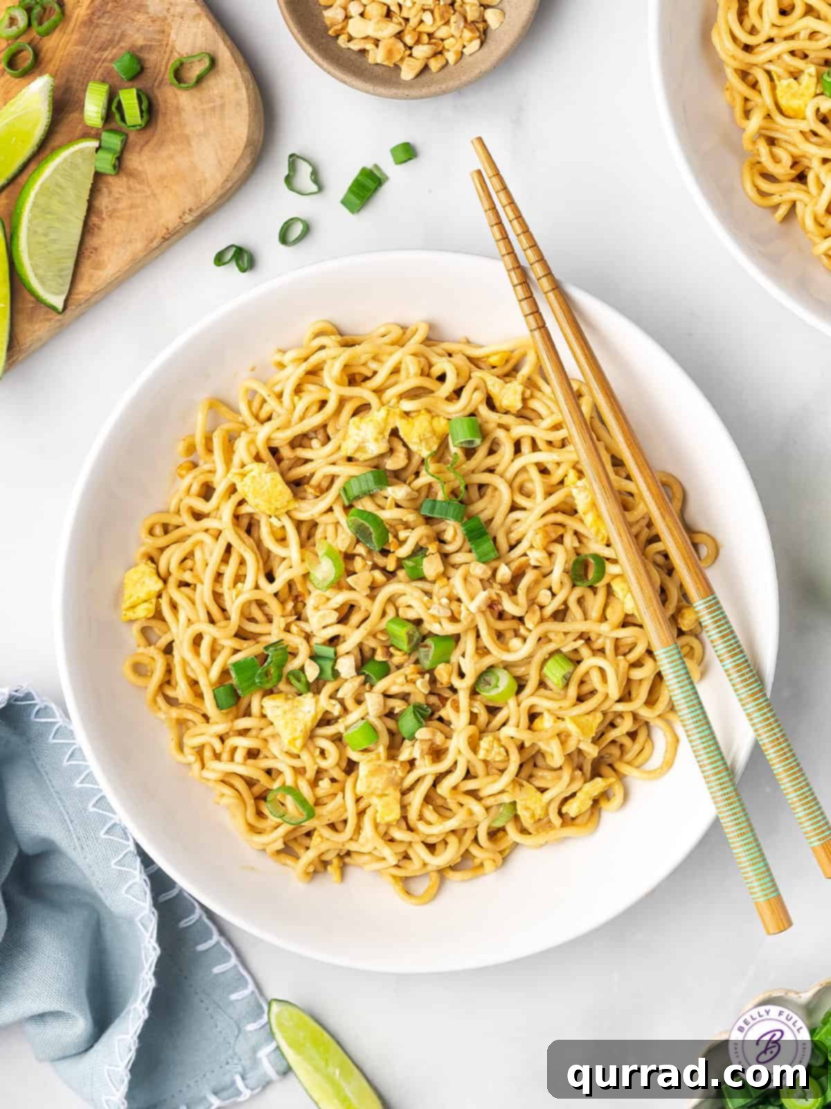 Ramen Pad Thai features inexpensive ramen noodles coated in a simple but flavor-packed peanut sauce. Ready in 10 minutes! Overhead view of a bowl of ramen pad thai