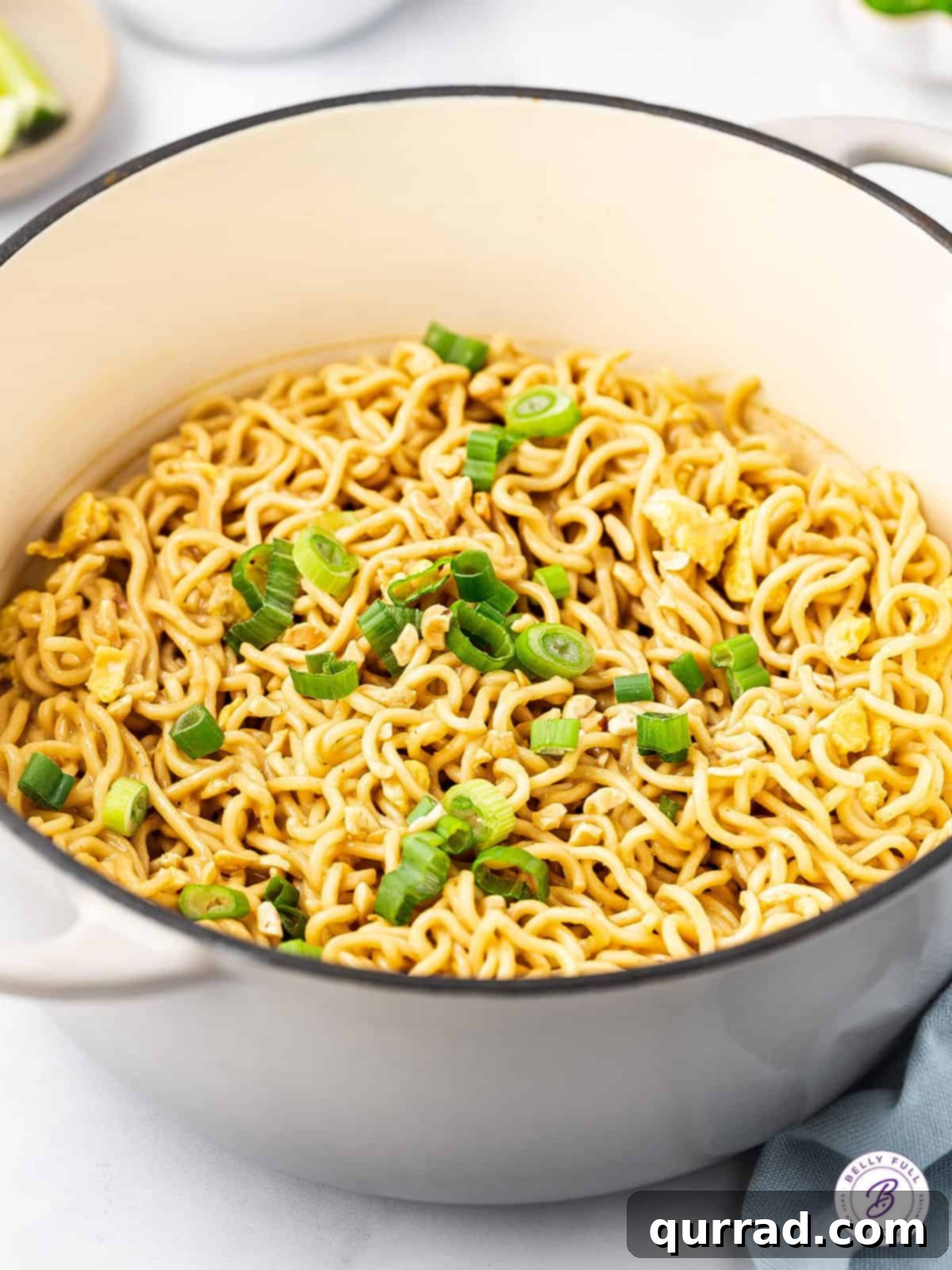 Ramen Pad Thai features inexpensive ramen noodles coated in a simple but flavor-packed peanut sauce. Ready in 10 minutes! Ramen pad Thai in a pot