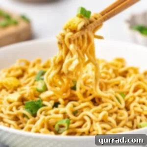 Pad Thai Ramen 2 Chopsticks holding up some ramen pad thai