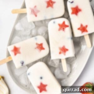 Overhead view of yogurt popsicles with red stars