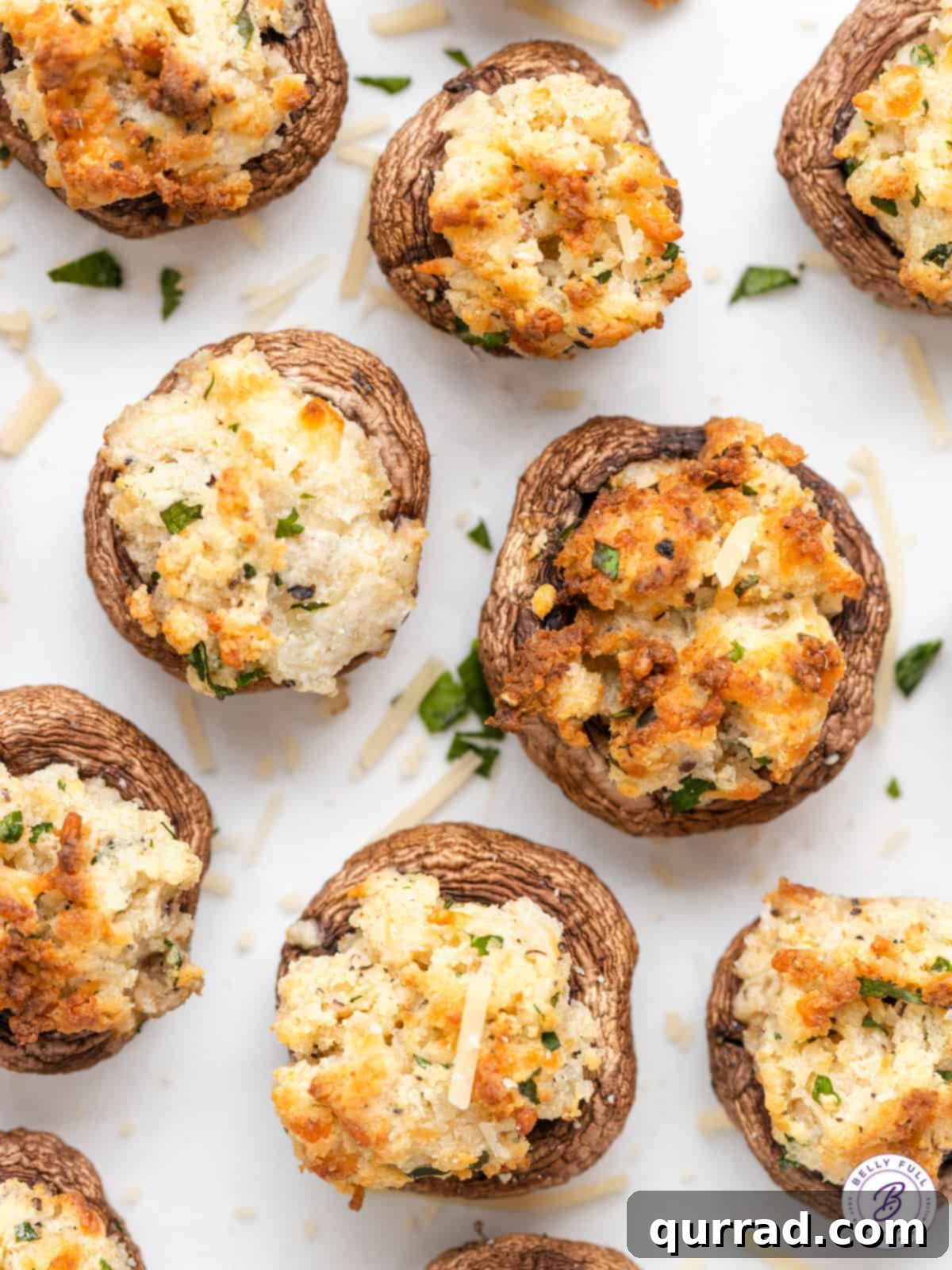 An attractive overhead shot of air-fried cream cheese stuffed mushrooms, perfectly arranged. Overhead view of cream cheese stuffed mushrooms ready to serve