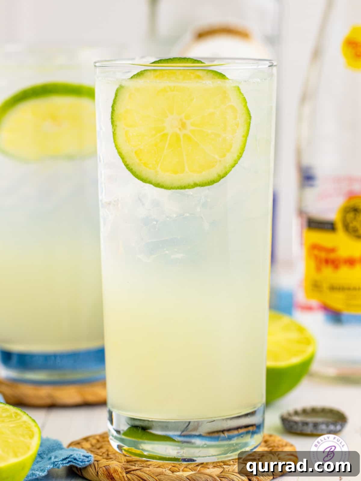 Texas Ranch Water Refresher 5 Two ranch water cocktails in tall glasses, garnished with lime