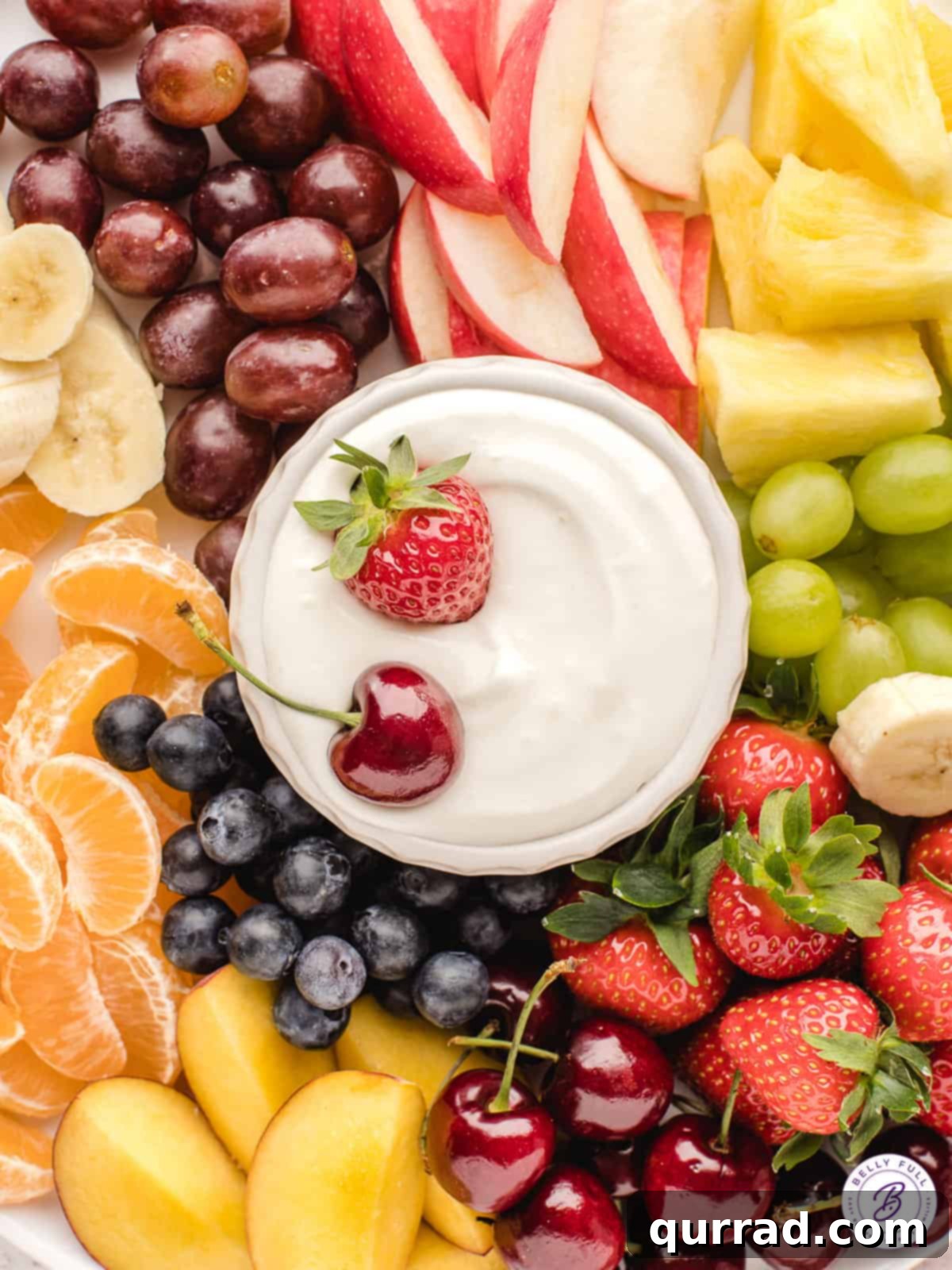 Creamy Fruit Delight 5 overhead fruit dip surrounded by cut fresh fruit