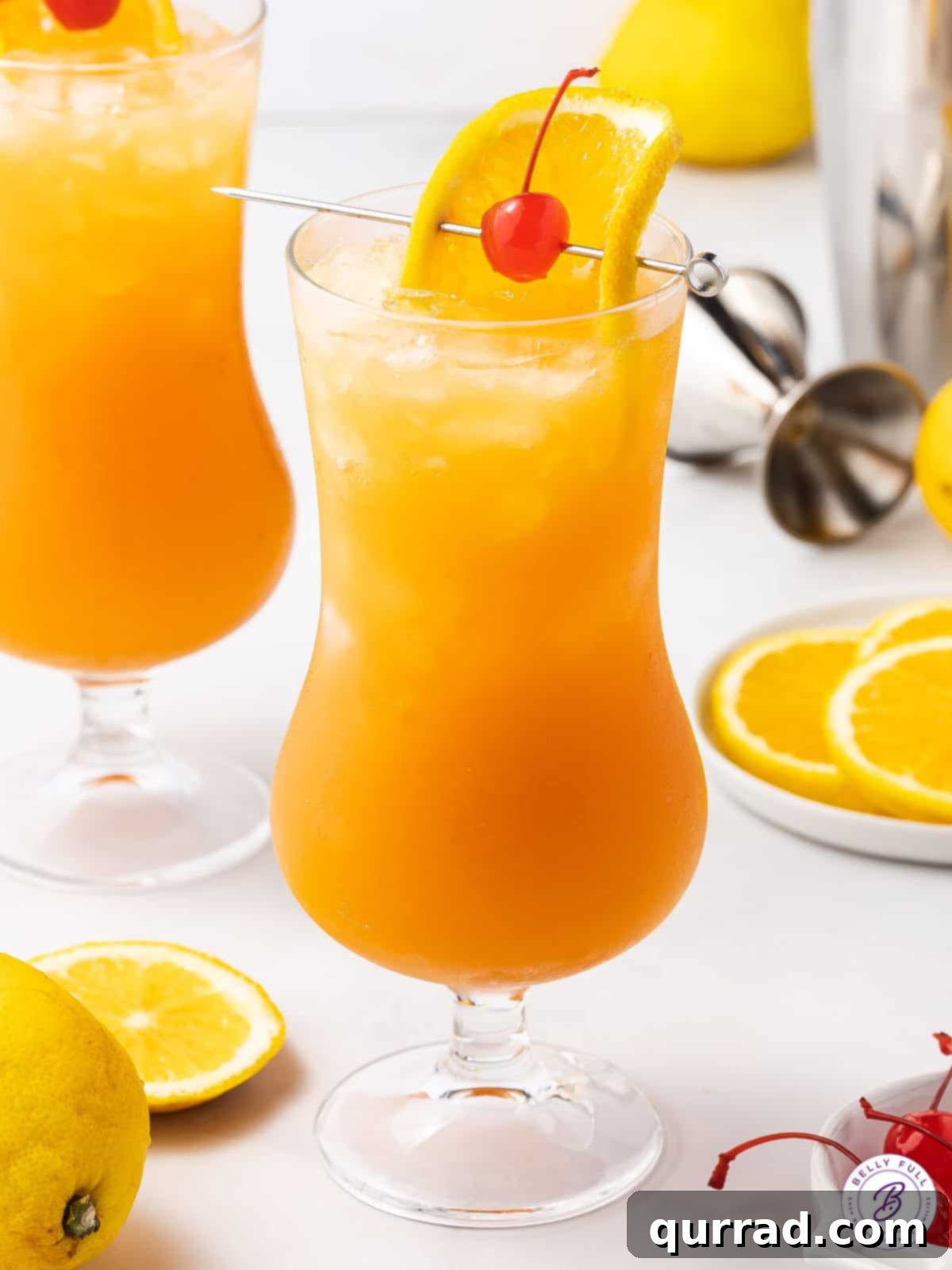 Savor the perfect Hurricane Drink, a tropical delight that captures the essence of summer. A hurricane drink in a glass, ready to be enjoyed.