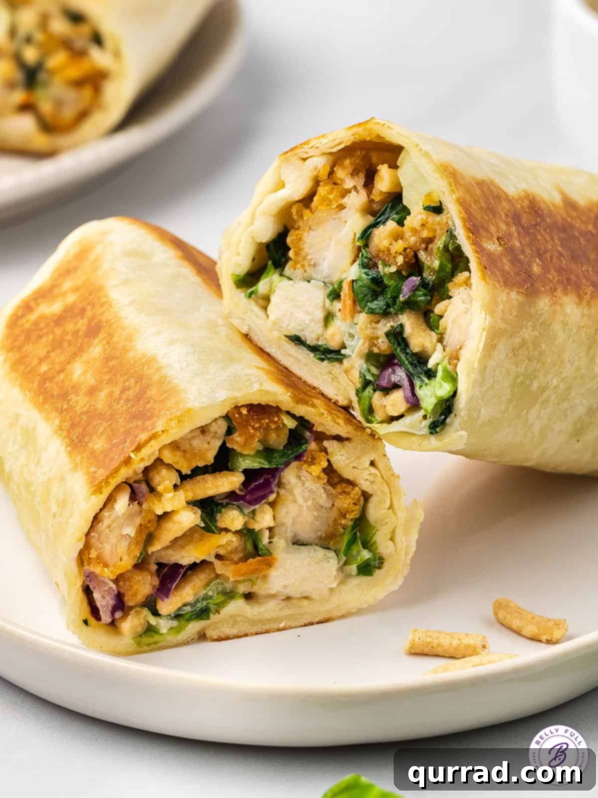 Zesty Asian Chicken Wraps 2 chicken salad wrap sliced in half
