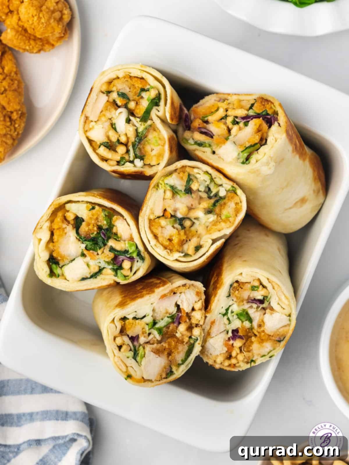 Zesty Asian Chicken Wraps 4 overhead serving tray of 3 halved chicken salad wraps