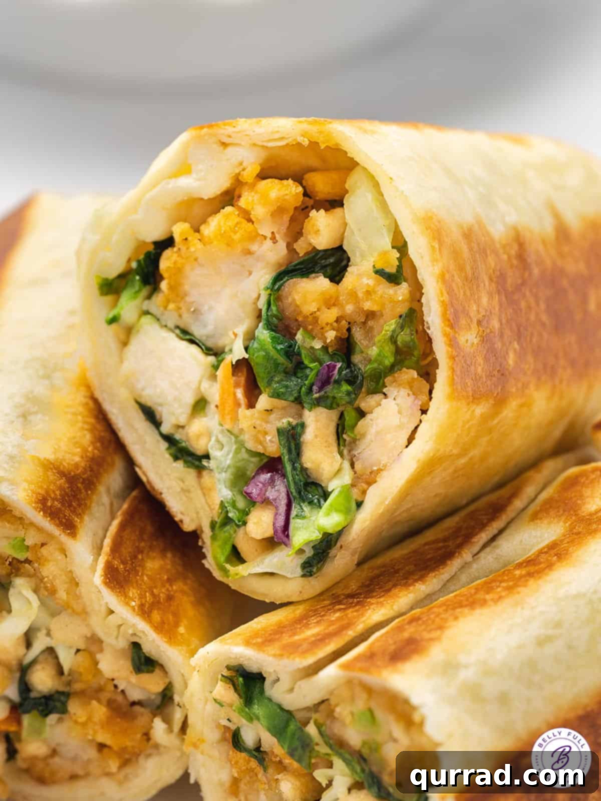 Zesty Asian Chicken Wraps 5 close up half Asian chicken salad wrap