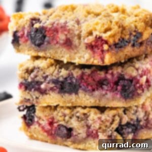A stack of three berry crumb bars