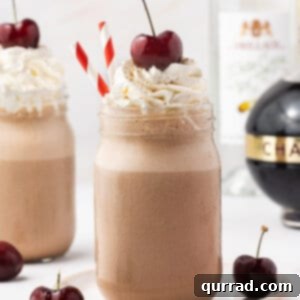 A black forest milkshake sitting on a plate