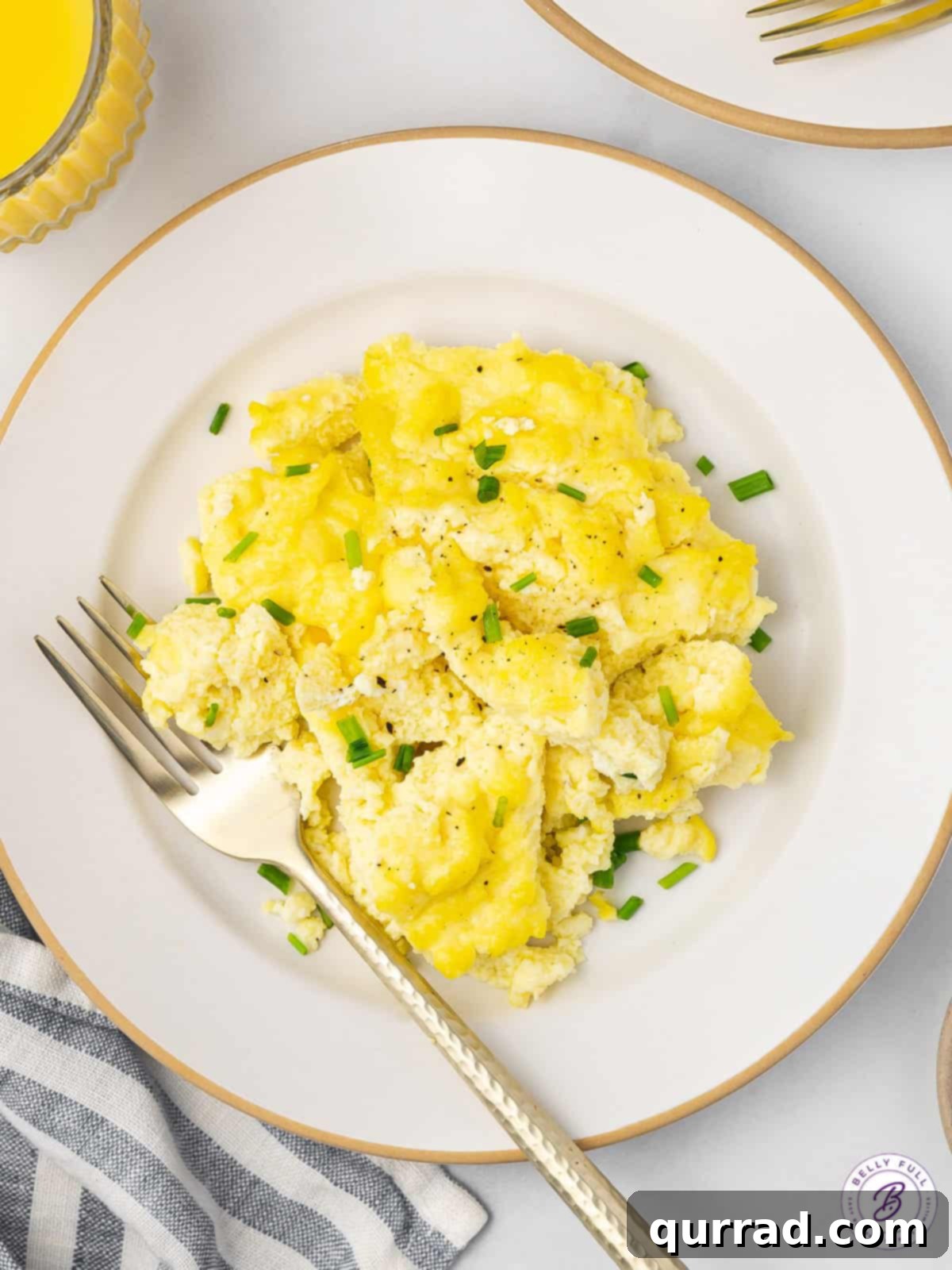 Scrambled eggs on a white plate