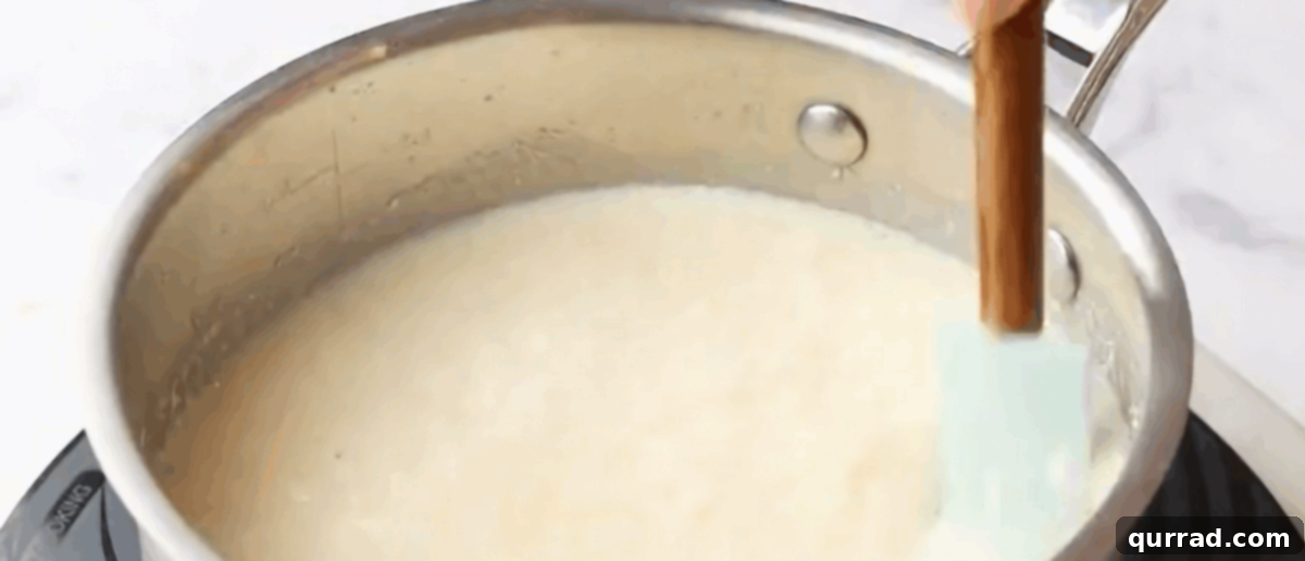 The process of making the creamy coconut layer for the cake.