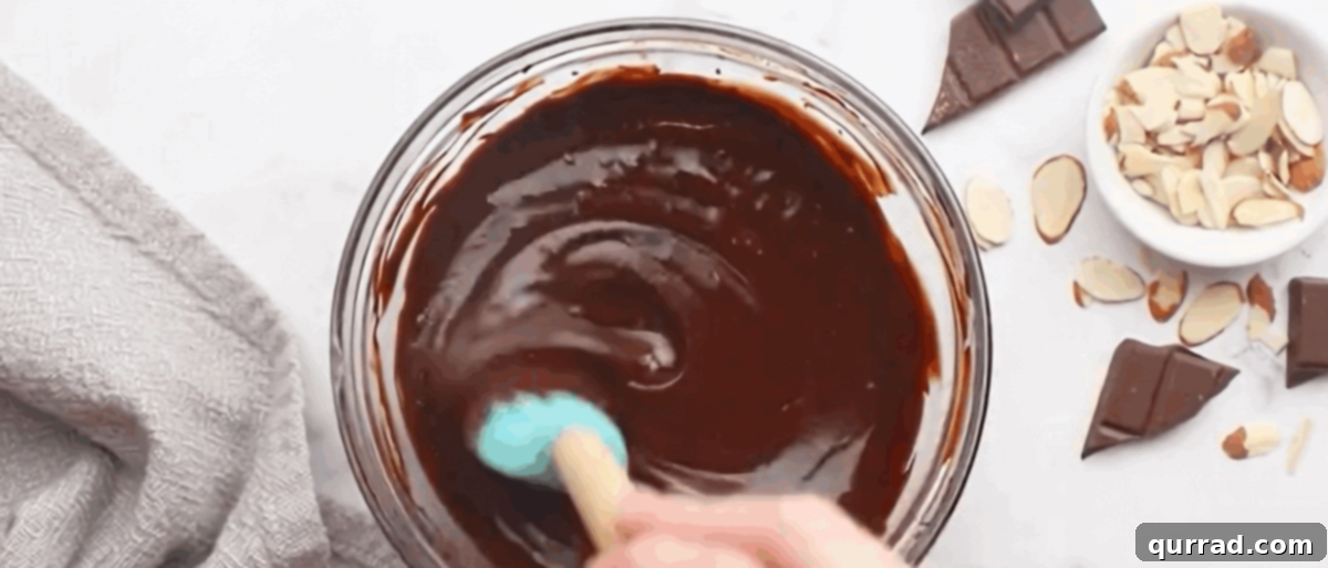 Melting dark chocolate and coconut oil for the rich topping.