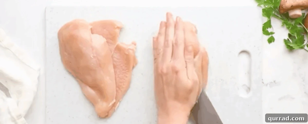 Cutting the chicken into cutlets. 