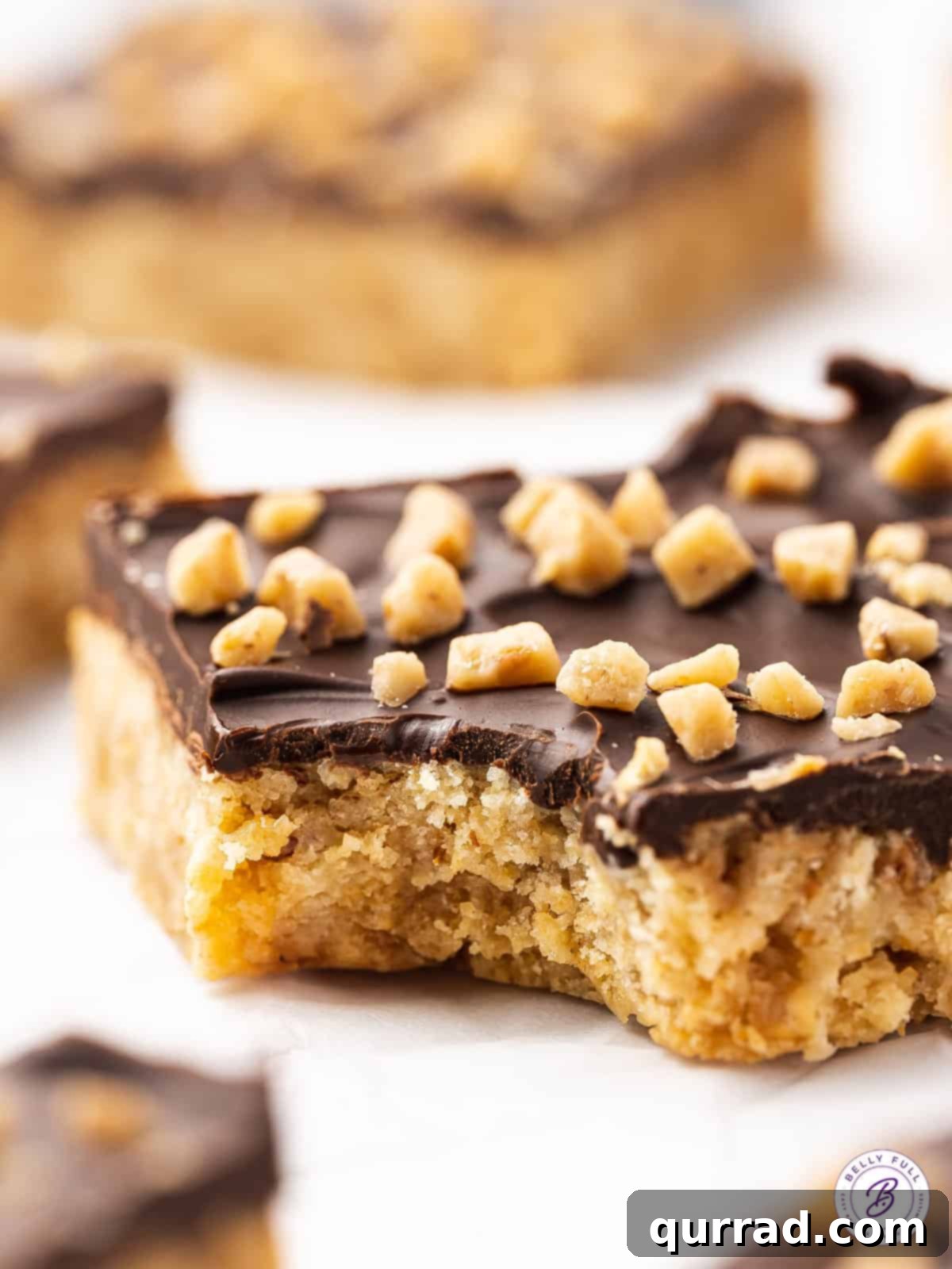 A single Ritz Skor bar with a bite taken out, showing its delicious layers.
