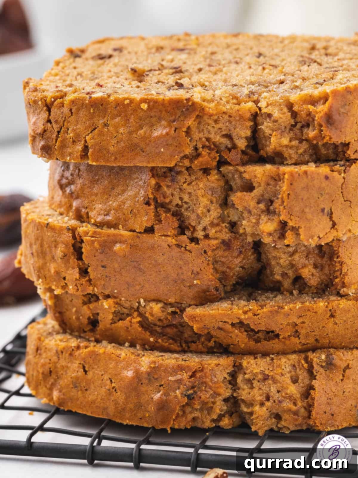 Sweet Date and Nut Loaf 11 5 slices of stacked date nut bread.