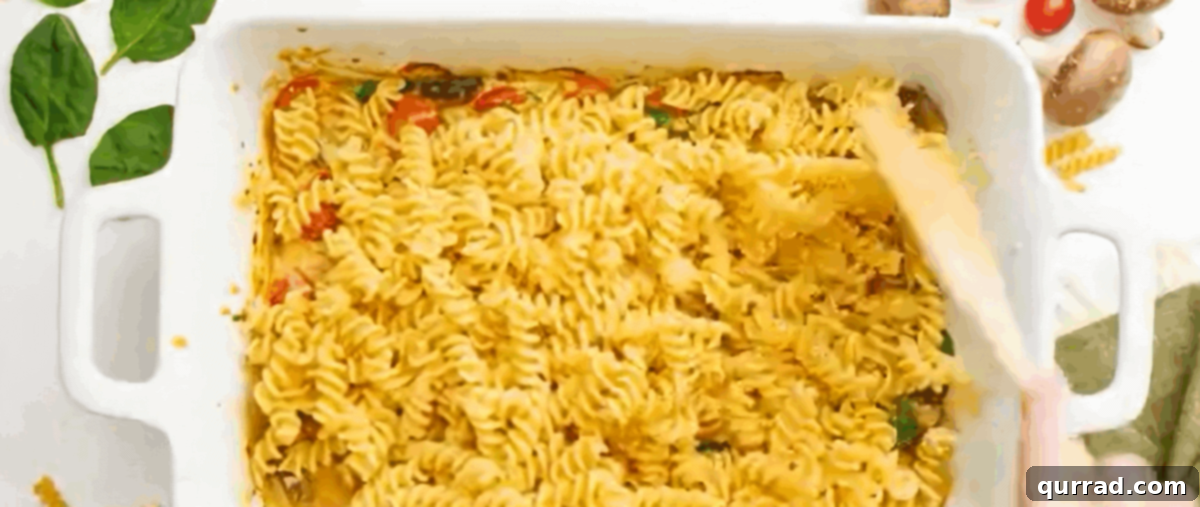Velvety Boursin Garlic Herb Pasta 4 Adding cooked pasta to the pan with the creamy Boursin sauce and roasted vegetables.