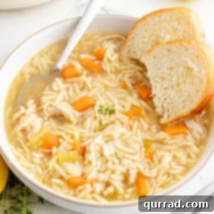 Zesty Lemon Chicken Orzo Soup 6 A bowl of lemon chicken orzo soup