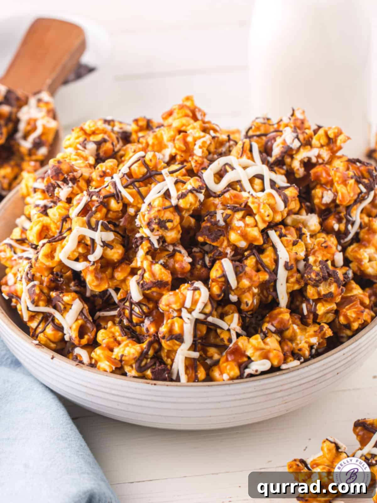 Duotone Chocolate Popcorn Treat 5 bowl of caramel corn with melted dark and white chocolate