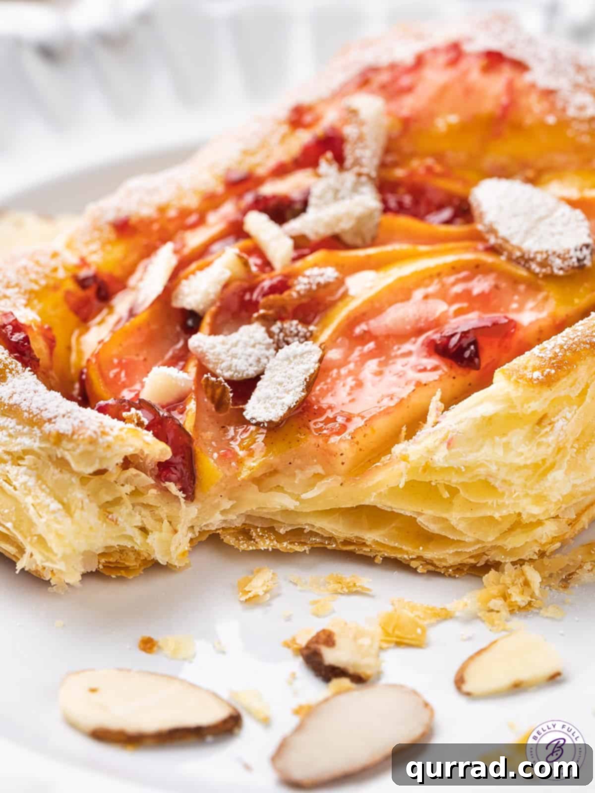 Golden Caramel Pear Tarts 5 close up slice of baked puff pastry tart