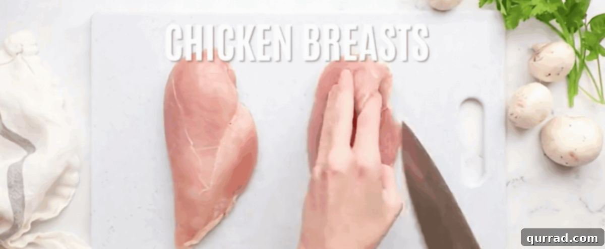 Creamy Boursin Chicken 3 Cutting the chicken breasts into thin cutlets.