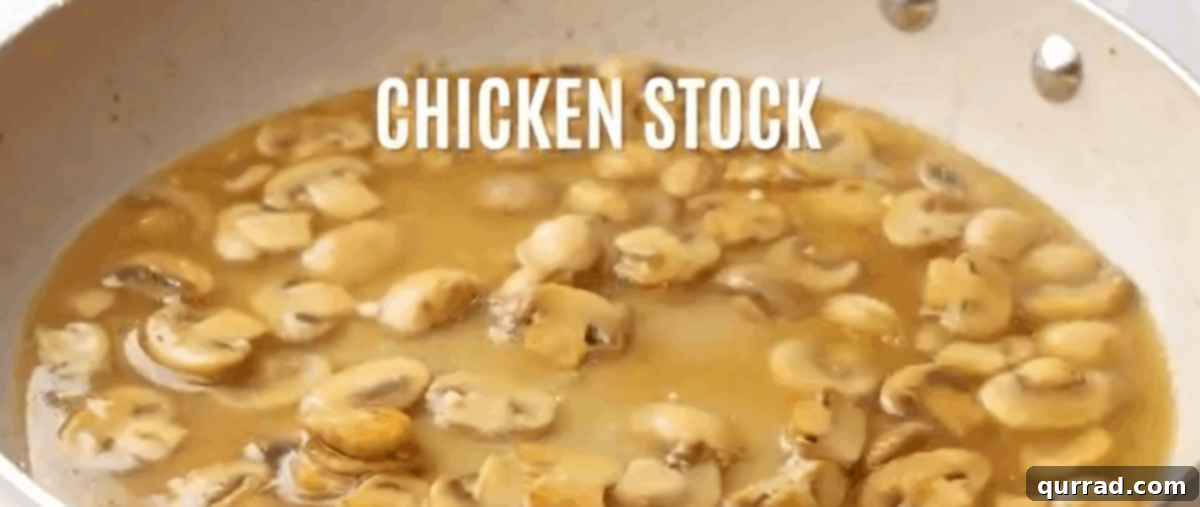 Creamy Boursin Chicken 6 Deglazing the pan with white wine and chicken broth for the Boursin sauce.