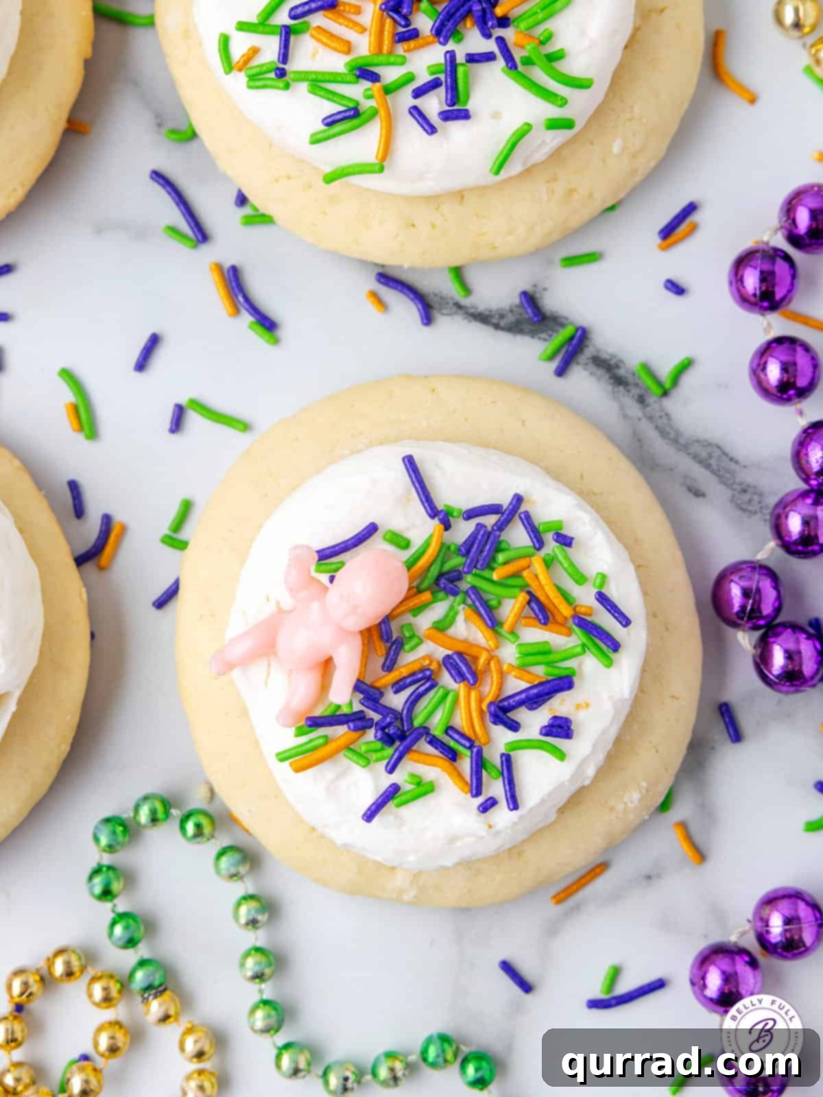 Vibrant Mardi Gras Lofthouse Cookies 2 Mardi Gras Lofthouse Cookie with sprinkles and plastic toy doll