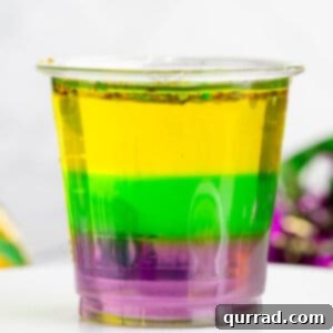 purple, green, and yellow layered Mardi Gras jello shots