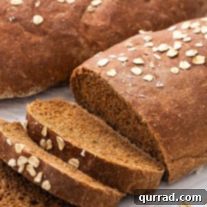 Copycat Cheesecake Factory brown bread with three pieces sliced