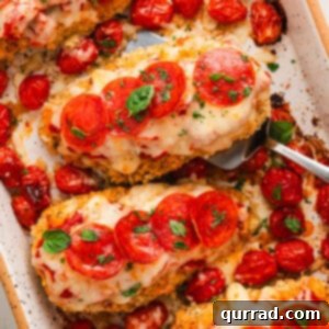 A serving of Pizza Parmesan Chicken in a small casserole dish