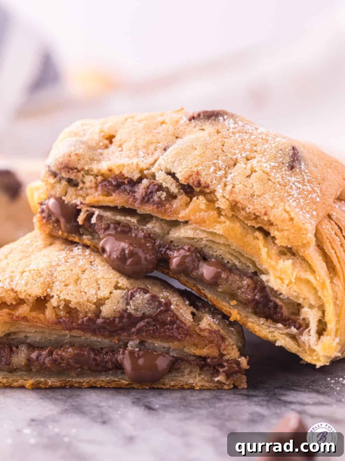 baked croissant stuffed with gooey cookie dough