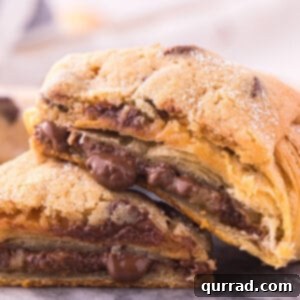 baked croissant stuffed with gooey cookie dough