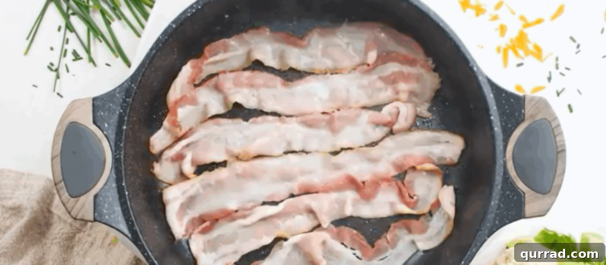 Cooking bacon in a skillet.