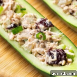 Close up of a cucumber boat with chicken salad