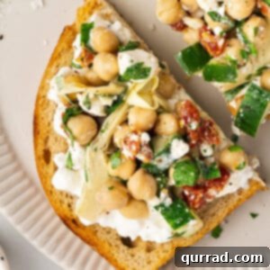 Chickpea & Cottage Cheese Power Toast 2 Overhead view of chickpea salad and cottage cheese toast on a plate
