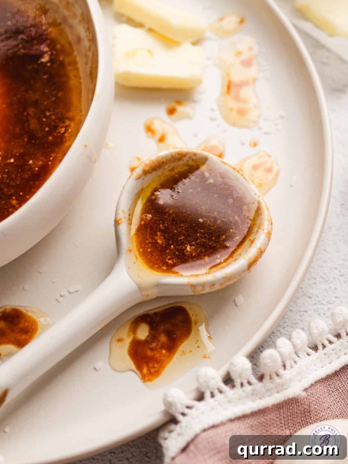Infinity sauce is a savory brown butter soy sauce filled with nutty umami flavor. Enjoy over pork, chicken, veggies, and more. A spoon of brown butter soy sauce