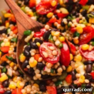 Vibrant Tex-Mex Couscous Salad 3 close up spoonful of cowboy caviar couscous salad