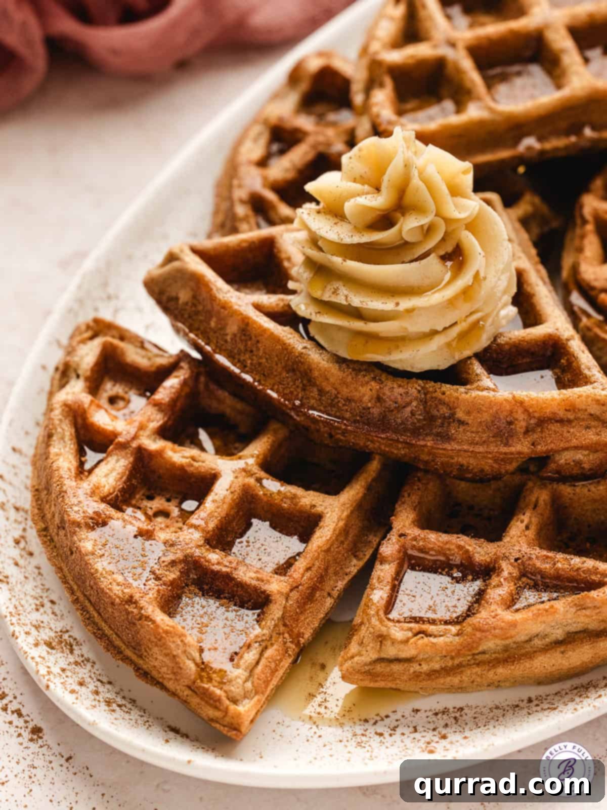Cozy Cinnamon Waffles 2 plate of cinnamon waffles with whipped maple butter