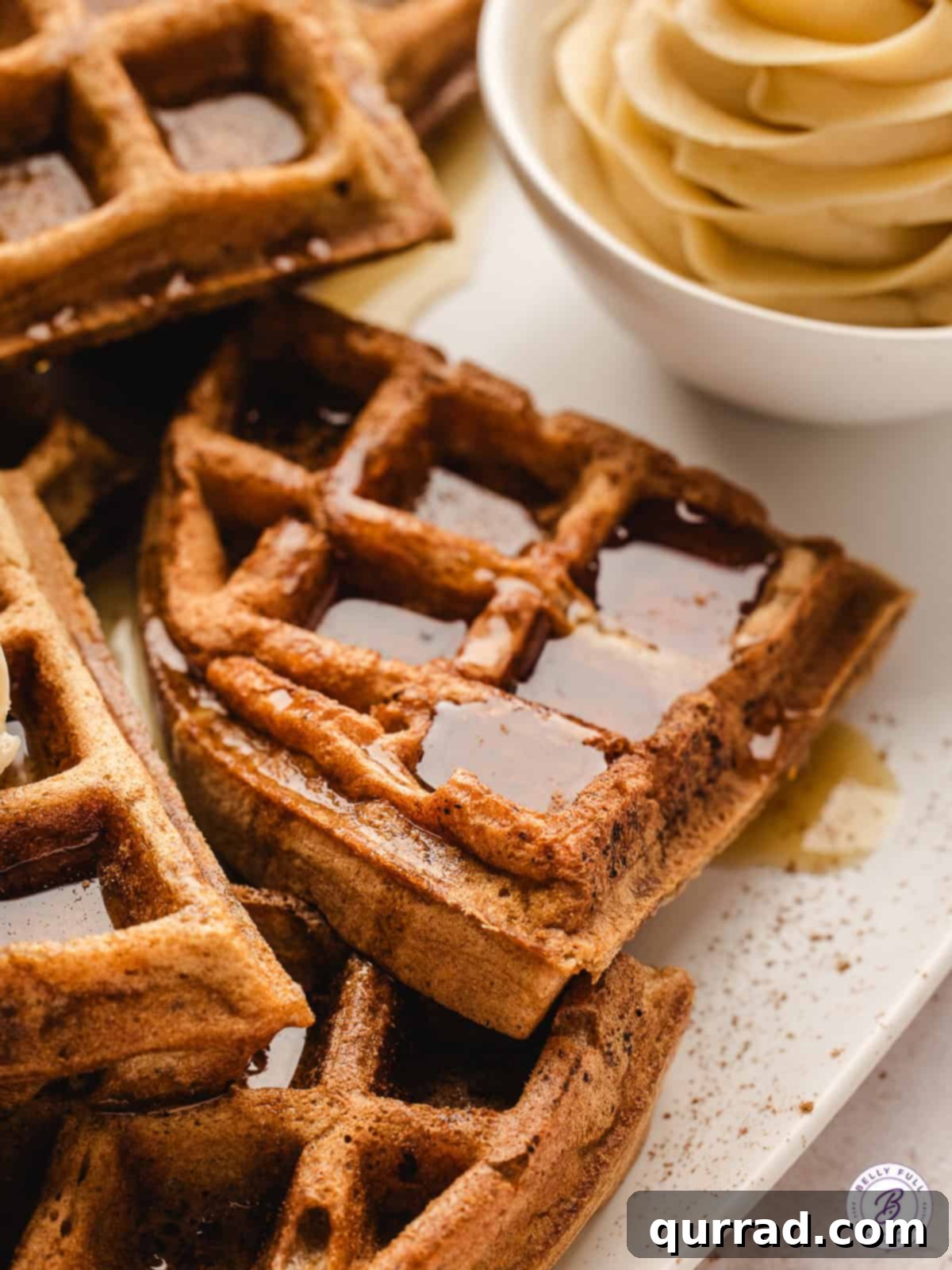 Cozy Cinnamon Waffles 3 cinnamon waffle wedge with maple syrup