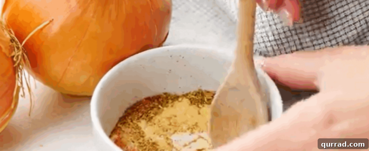 Preparing the seasoning mix in a small white bowl, ready to be sprinkled over onions.